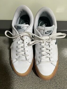 Nike Women’s White Leather Sneakers with Gum Sole and Black Swoosh